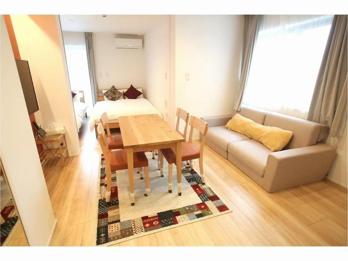 Apartment Hotel Tenjin Tumugu 후쿠오카 3*,